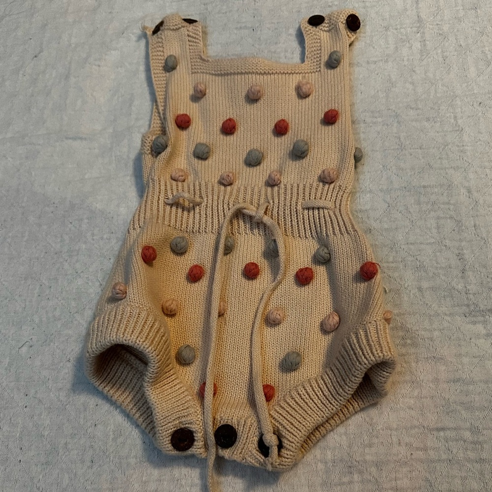 KNIT ROMPER WITH POLKA DOT DETAIL